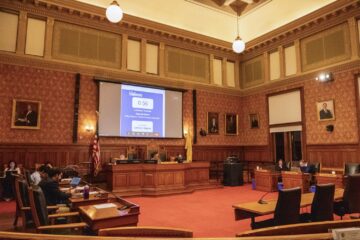 A March Cambridge city council meeting in City Hall's Sullivan Chamber. The Cambridge City Council took the first step in forcing landlords rather than tenants to pay broker fees during a Monday meeting. By Marina Qu